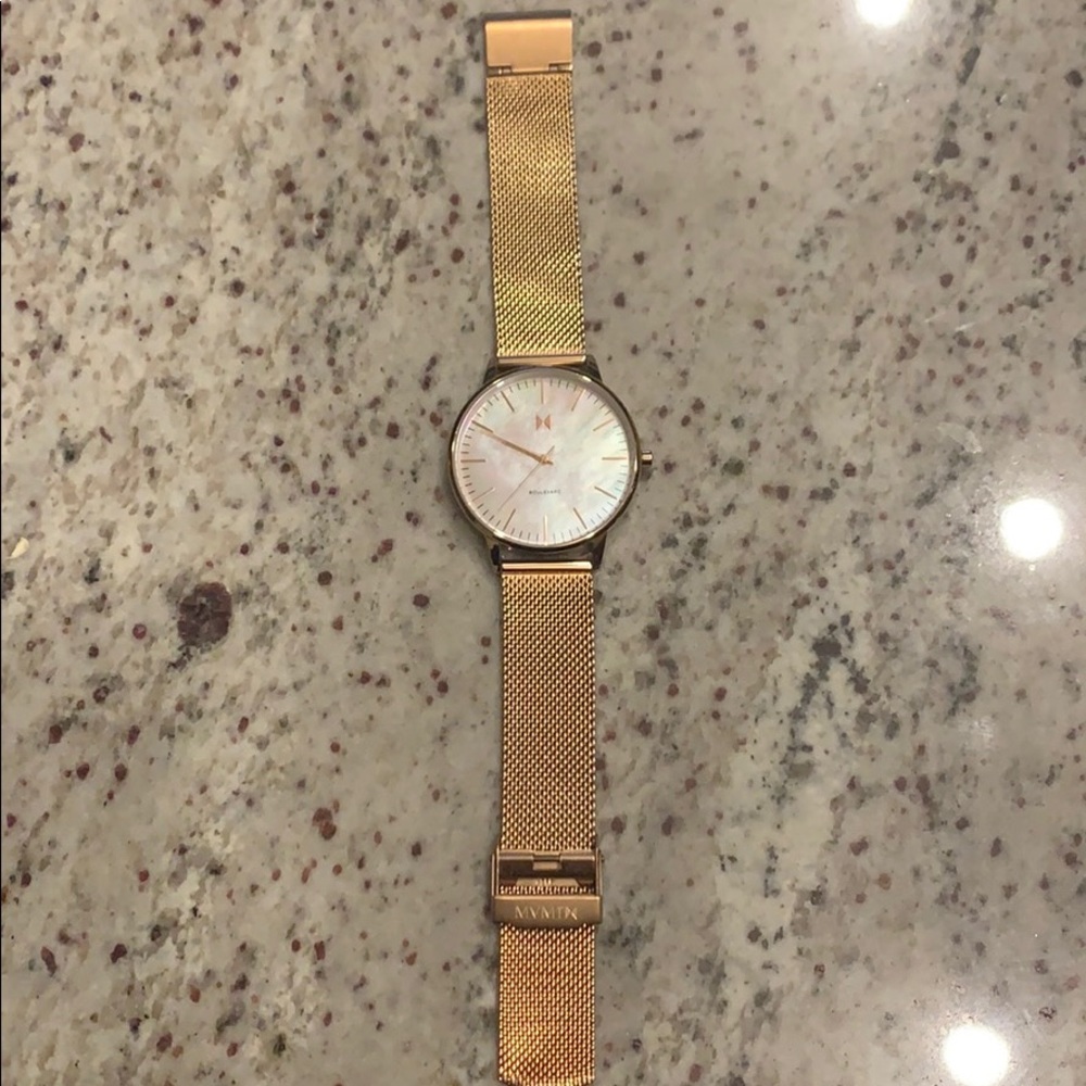 Rose gold woman’s MVMT Watch